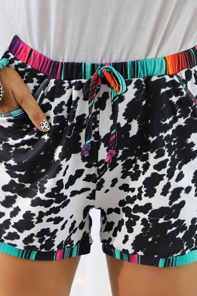 Pantalones casuales de cintura media rectos con estampado completo y parches de leopardo