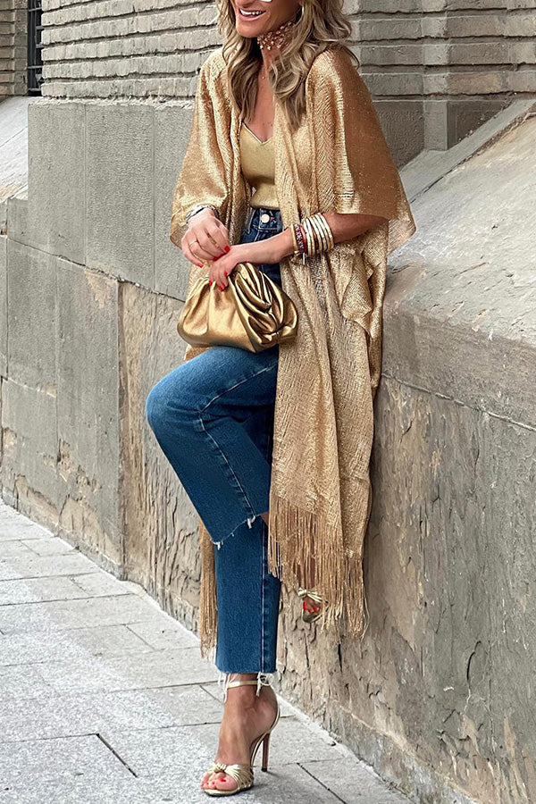Cárdigan dorado con borlas extendidas