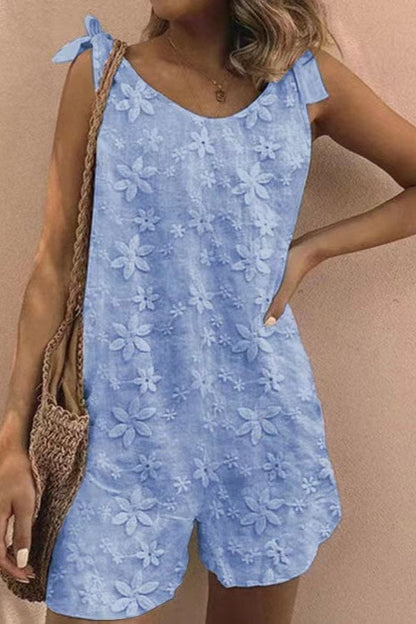 Mono sin mangas con cordones y bordado floral