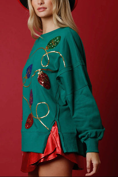 Sudadera con abertura y lentejuelas y luces navideñas