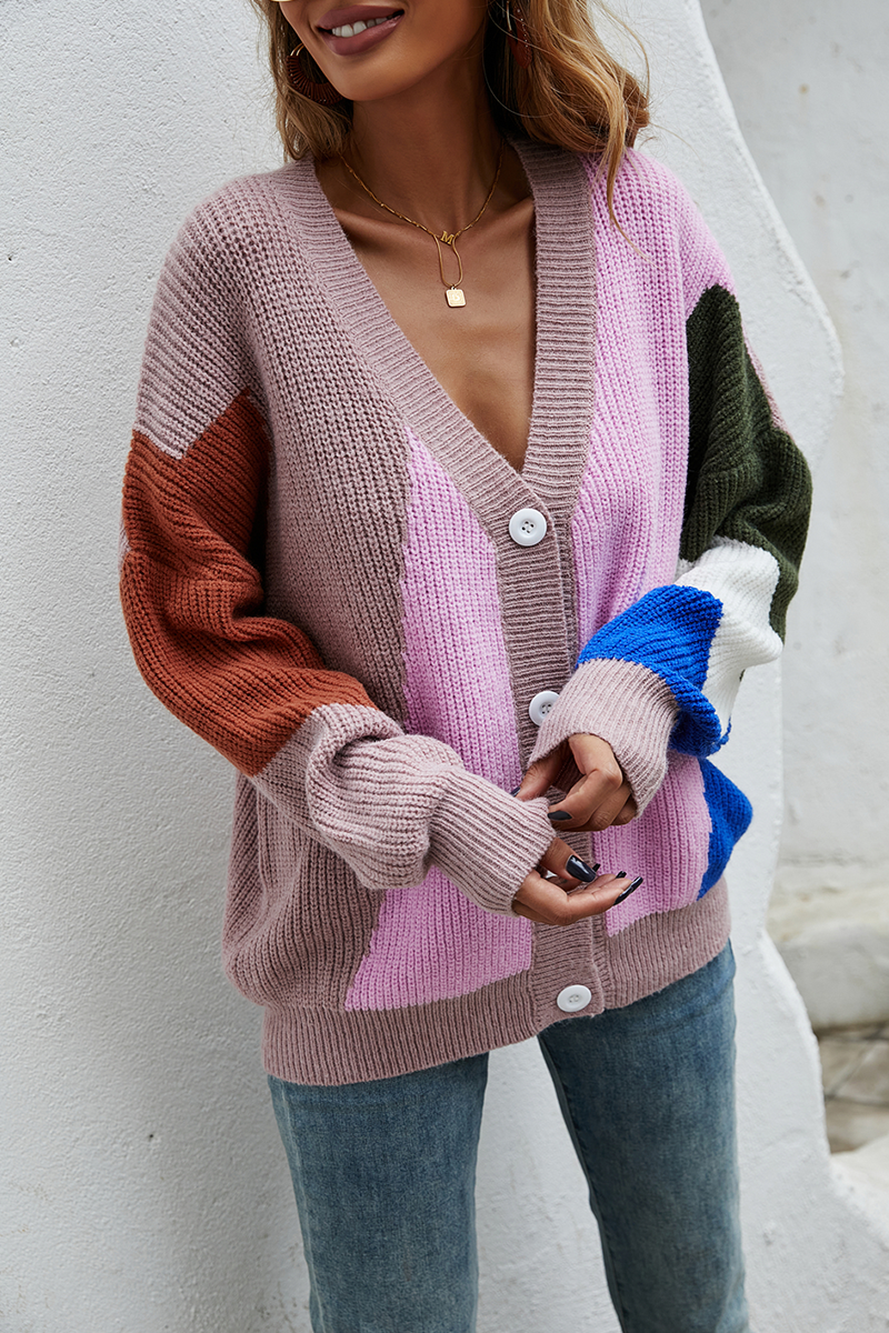 Suéter de cuello en V con hebilla y abertura en la articulación de color de calle de moda