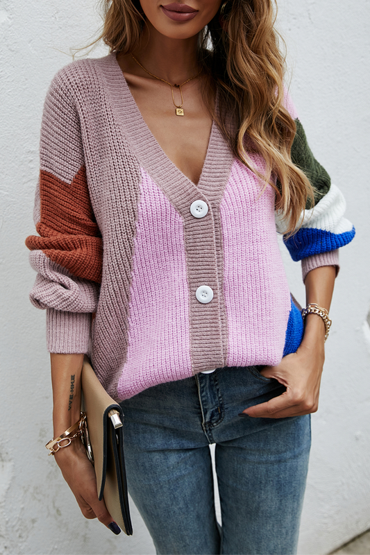 Suéter de cuello en V con hebilla y abertura en la articulación de color de calle de moda