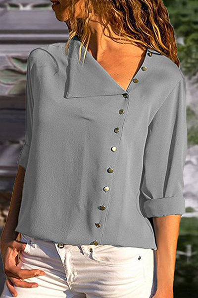 Blusa elegante con cuello oblicuo, hebilla y patchwork liso (7 colores)