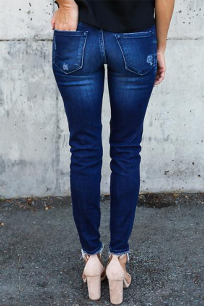 Pantalones casuales de tubo con pliegues y aberturas en la costura y rotos