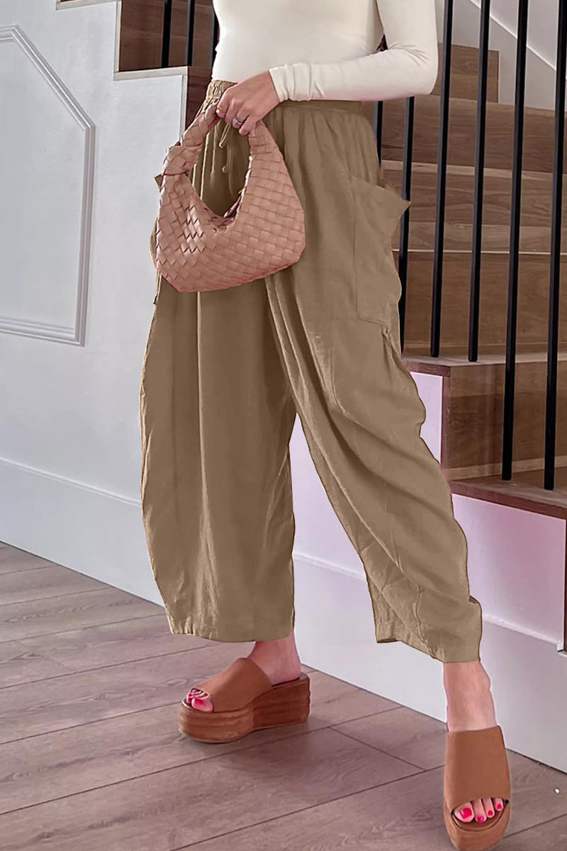 Pantalones casuales sencillos de color liso con bolsillos, holgados, de cintura media y pierna ancha.