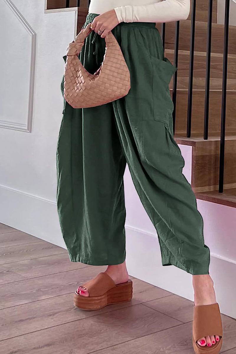 Pantalones casuales sencillos de color liso con bolsillos, holgados, de cintura media y pierna ancha.