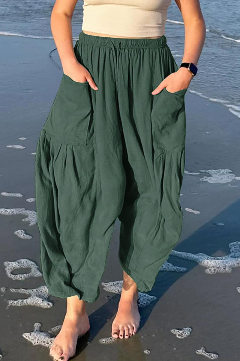 Pantalones casuales sencillos de color liso con bolsillos, holgados, de cintura media y pierna ancha.