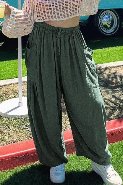 Pantalones casuales sencillos de color liso con bolsillos, holgados, de cintura media y pierna ancha.
