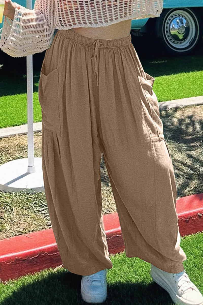 Pantalones casuales sencillos de color liso con bolsillos, holgados, de cintura media y pierna ancha.