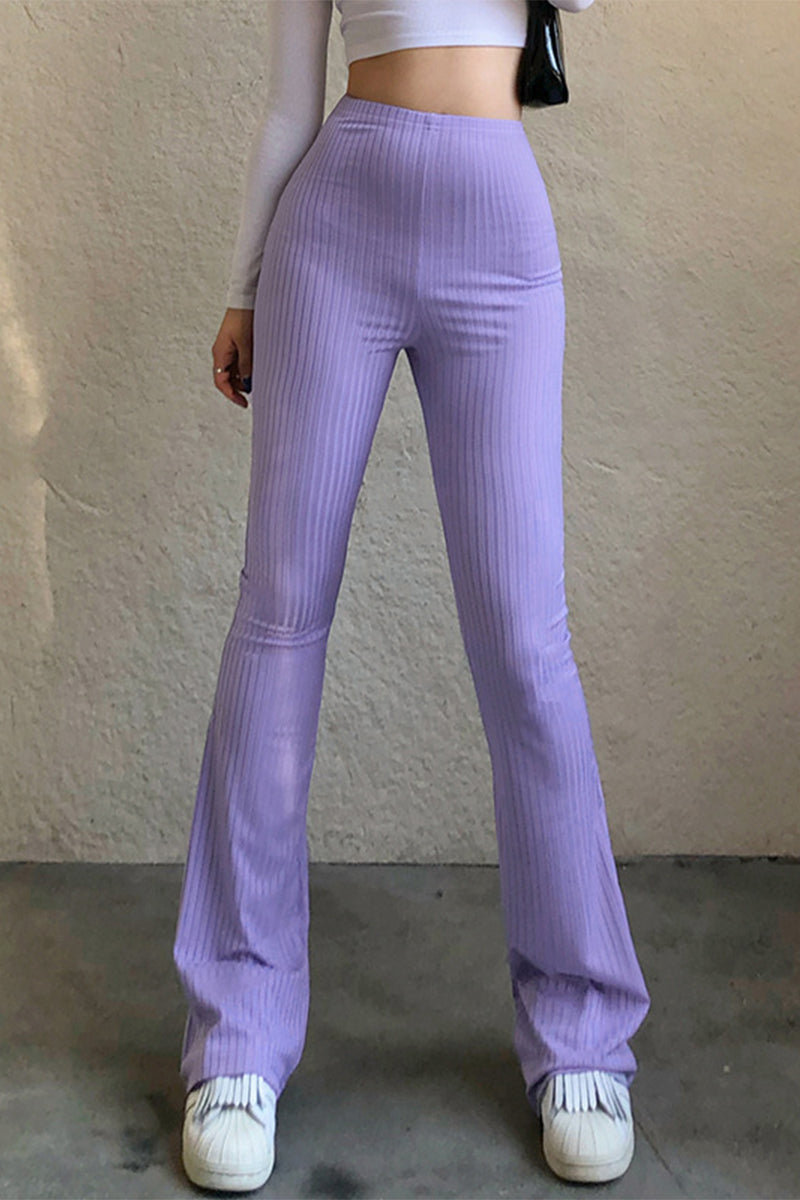 Pantalones casuales sencillos de color liso con cintura alta y botones.