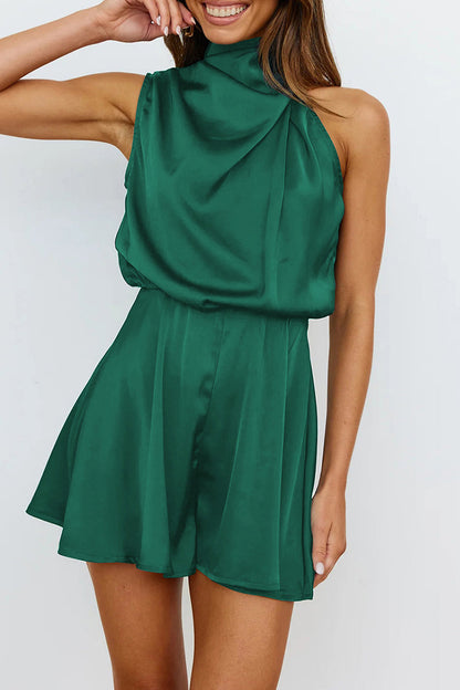 Mono elegante con cuello halter y pliegues sólidos