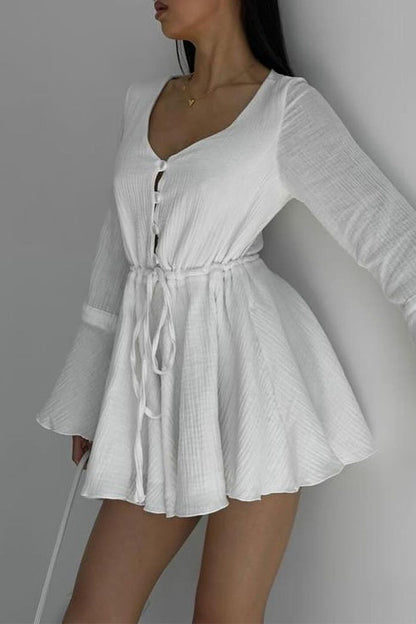 Mono elegante de color liso con cuello en V y frenillo con cordón ajustable