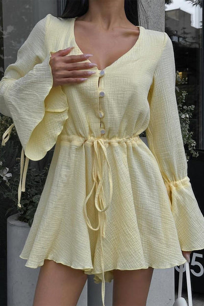 Mono elegante de color liso con cuello en V y frenillo con cordón ajustable