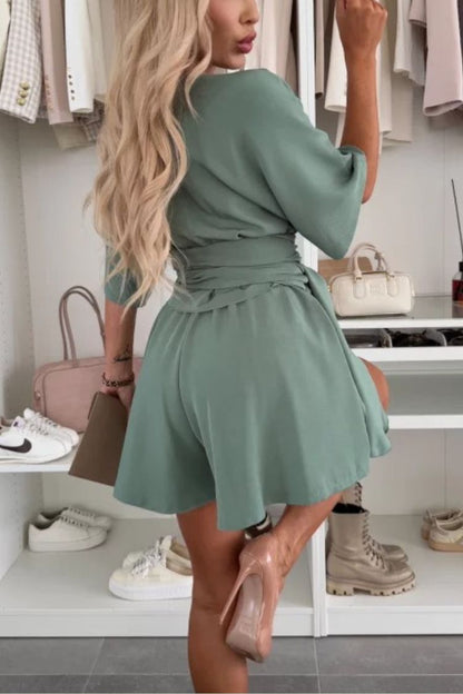 Mono holgado con cuello en V, mangas anchas y lazo, elegante y cómodo