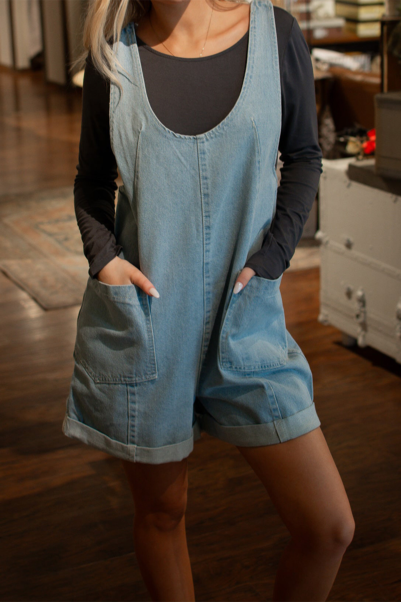 Mono vaquero holgado informal de uso diario con cuello en U, sin mangas y bolsillos de color liso