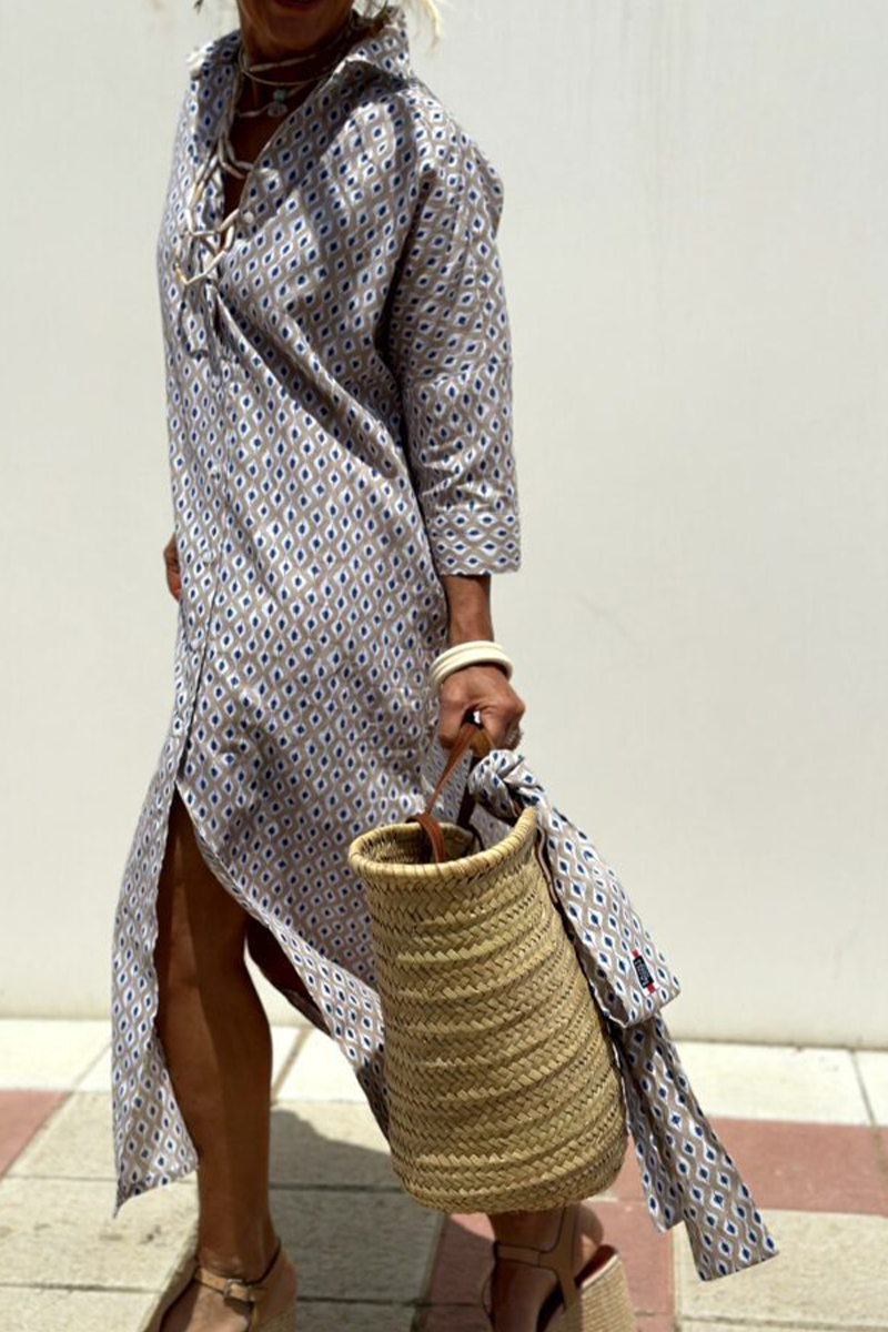 Vestidos camiseros informales con cuello vuelto, botones y cordones con estampado geométrico