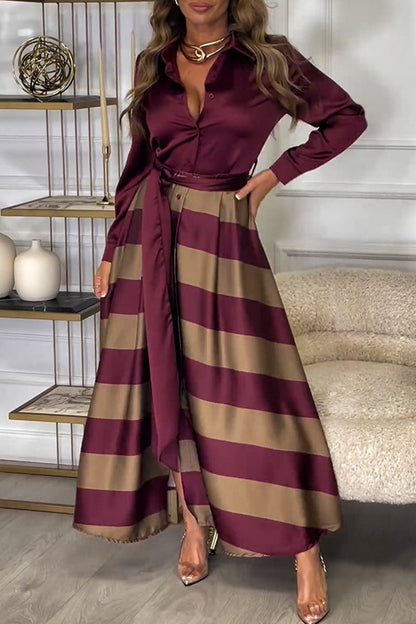 Elegante vestido camisero de rayas con cordones y cuello vuelto en contraste