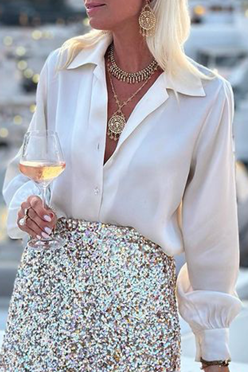 Blusas casuales con botones y cuello vuelto