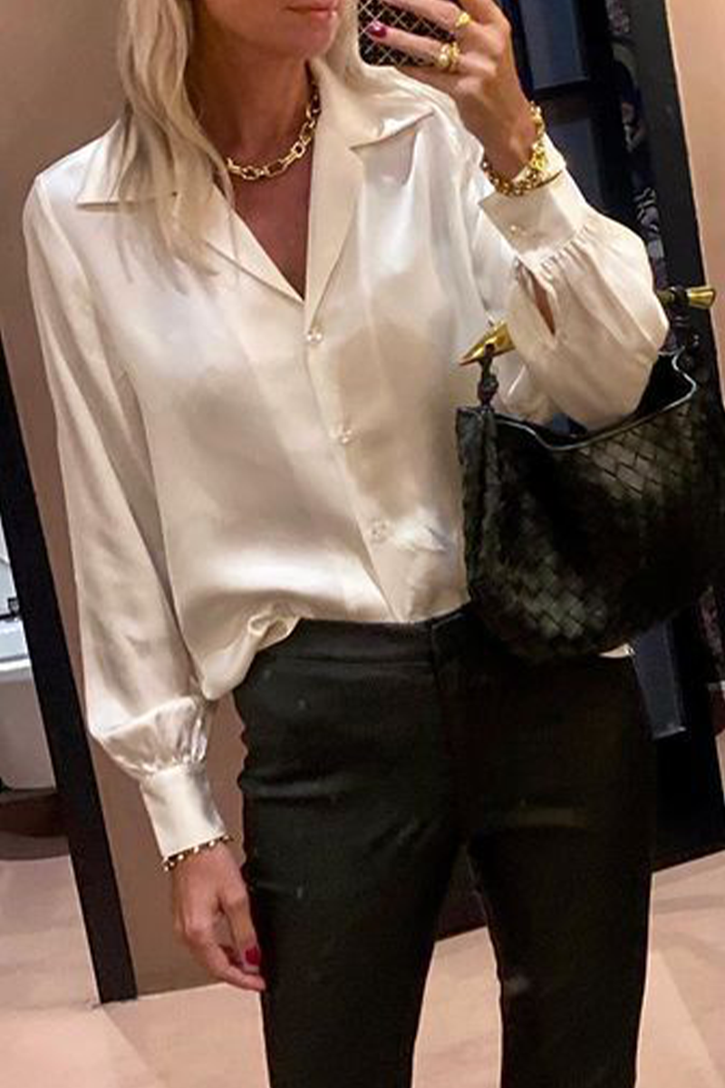 Blusas casuales con botones y cuello vuelto