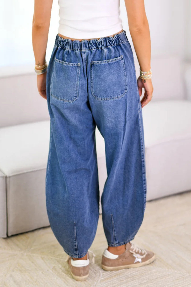 Vaqueros holgados de cintura media con cordones y bolsillos desgastados informales