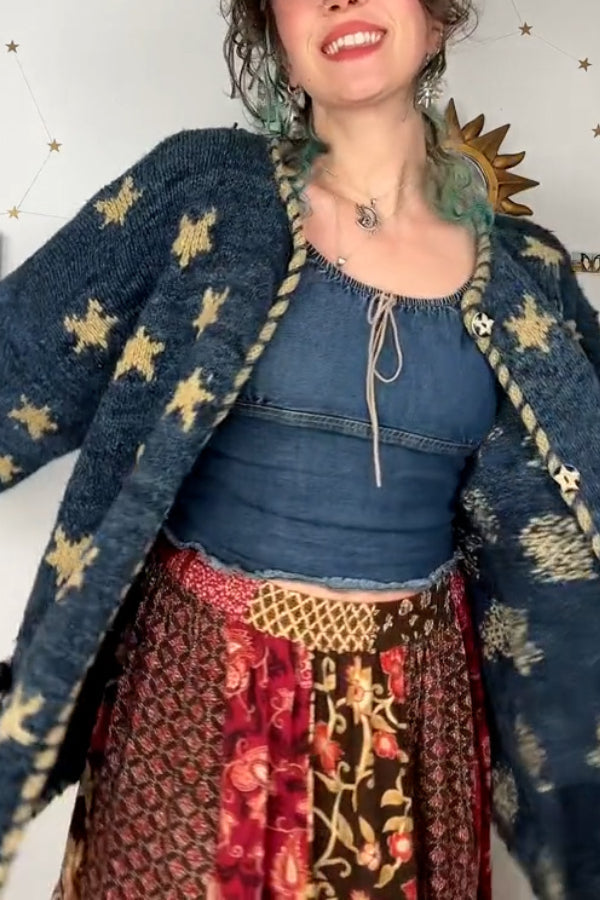 Suéter tipo cárdigan retro con cielo estrellado