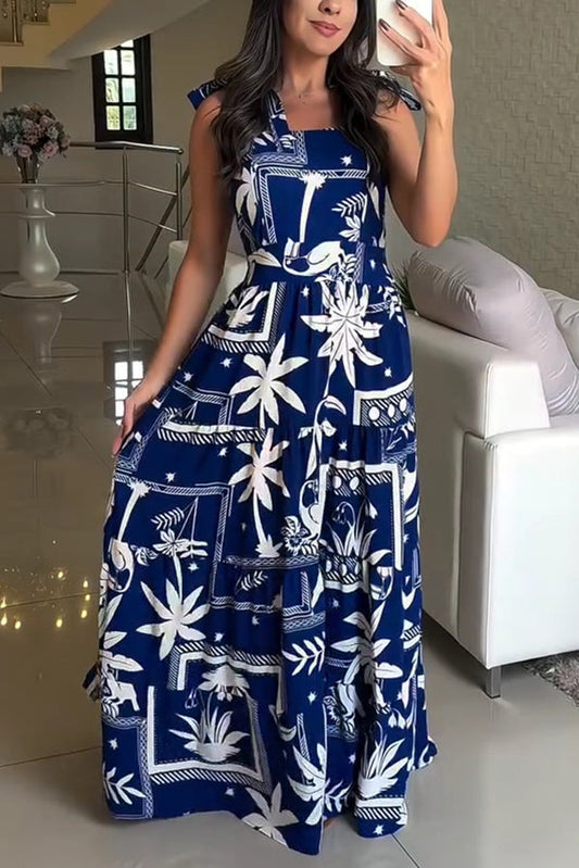 Vestido largo festivo plisado con tirantes y lazo en la espalda y estampado botánico