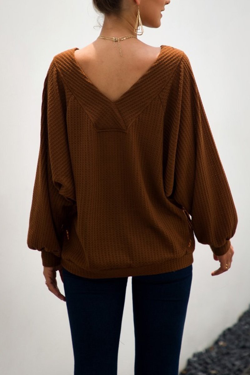 Suéter holgado de punto con bolsillos y hombros descubiertos (2 colores)