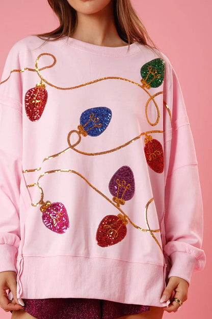 Sudadera con abertura y lentejuelas y luces navideñas