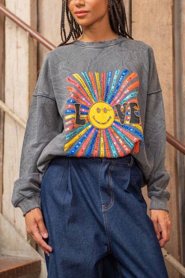 Exquisita sudadera de cuello redondo con cara sonriente bordada