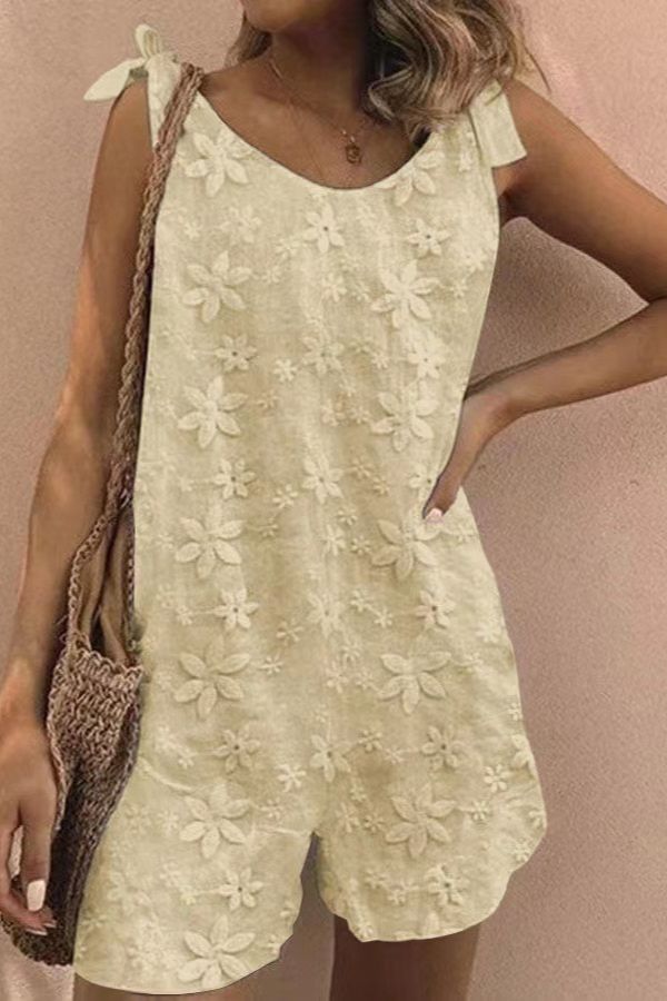 Mono sin mangas con cordones y bordado floral