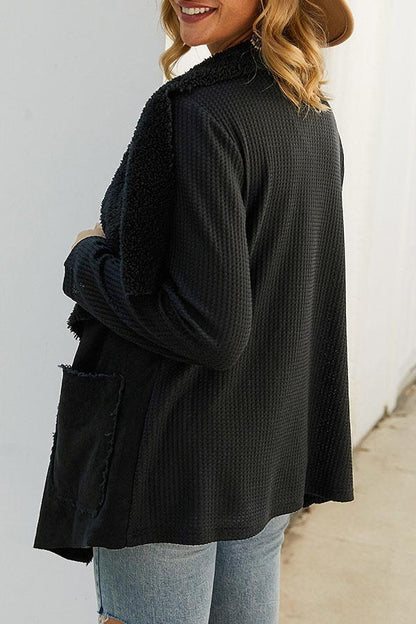 Abrigo irregular de felpa sólida