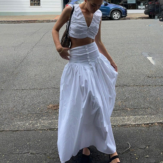 Conjunto de dos piezas de chaleco plisado francés con cintura alta y falda con dobladillo ancho