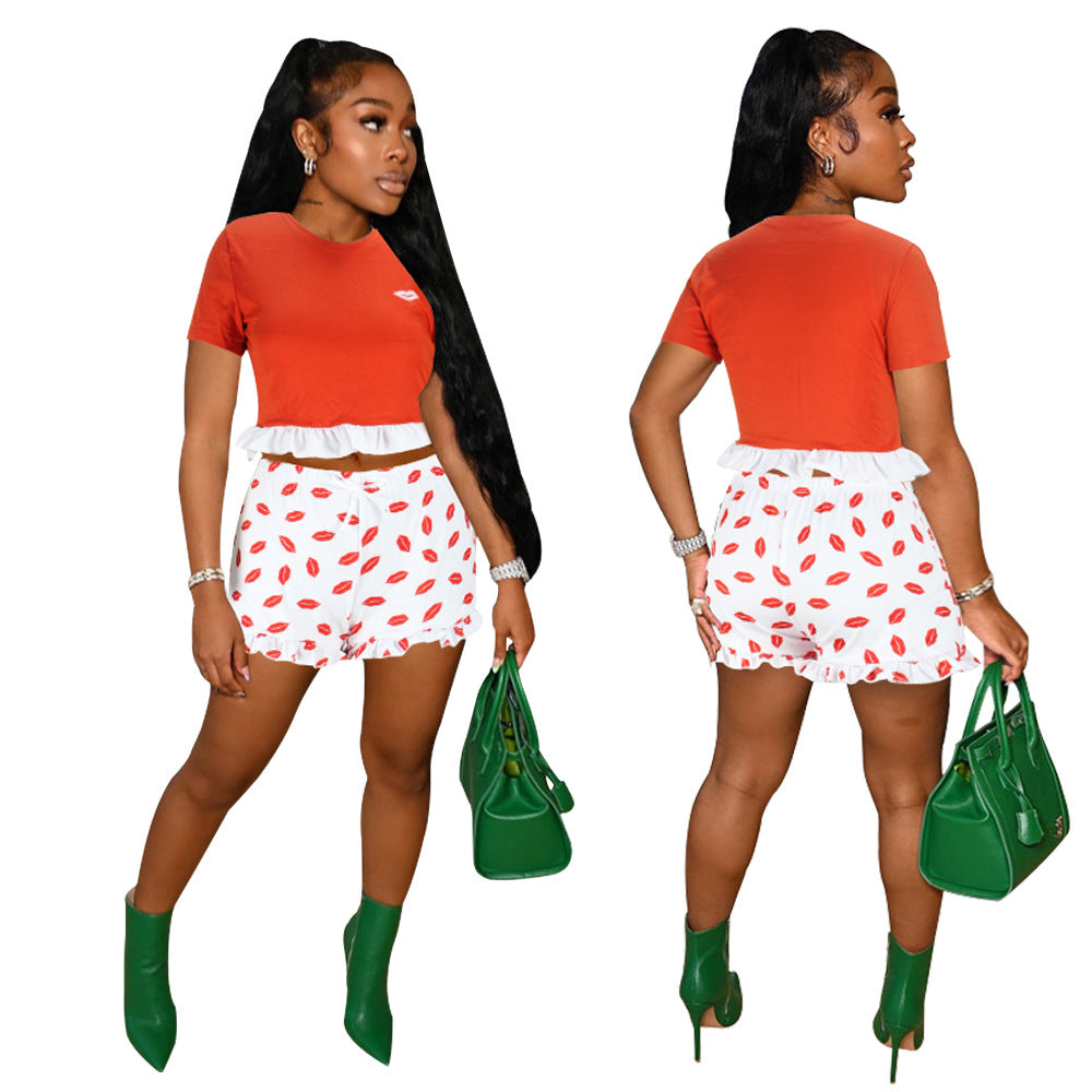 Conjunto de dos piezas formado por camiseta de manga corta y pantalón corto, con encaje y estampado de labios, para mujer