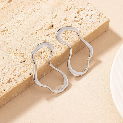 Mira – Abstract Wave Open Hoop Earrings