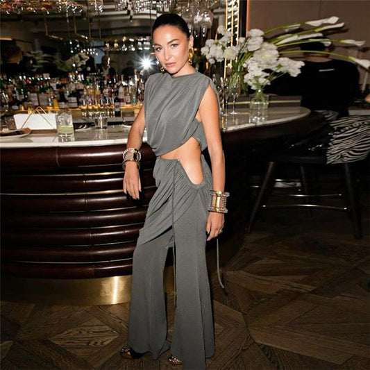 Conjunto de camiseta de cuello redondo plisado personalizado para mujer, pantalones de corte bota asimétricos irregulares de color sólido, otoño e invierno