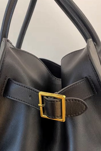 Bolso de mano con detalle de hebilla 
