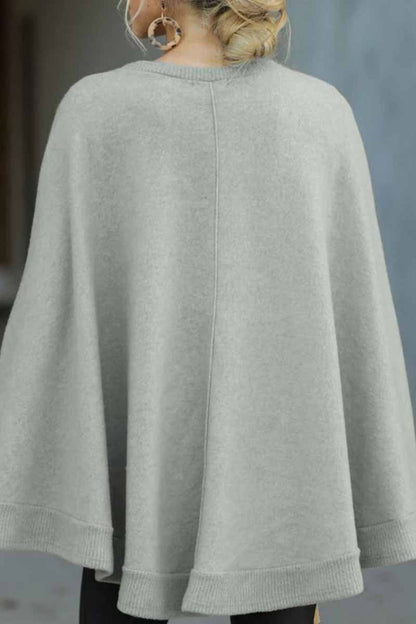 Tops holgados de cuello redondo con capa