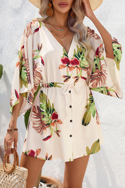 Mono amarillo de una pieza con estampado de plantas y cordones