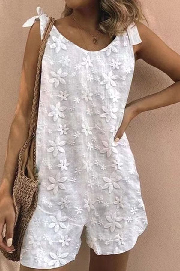 Mono sin mangas con cordones y bordado floral