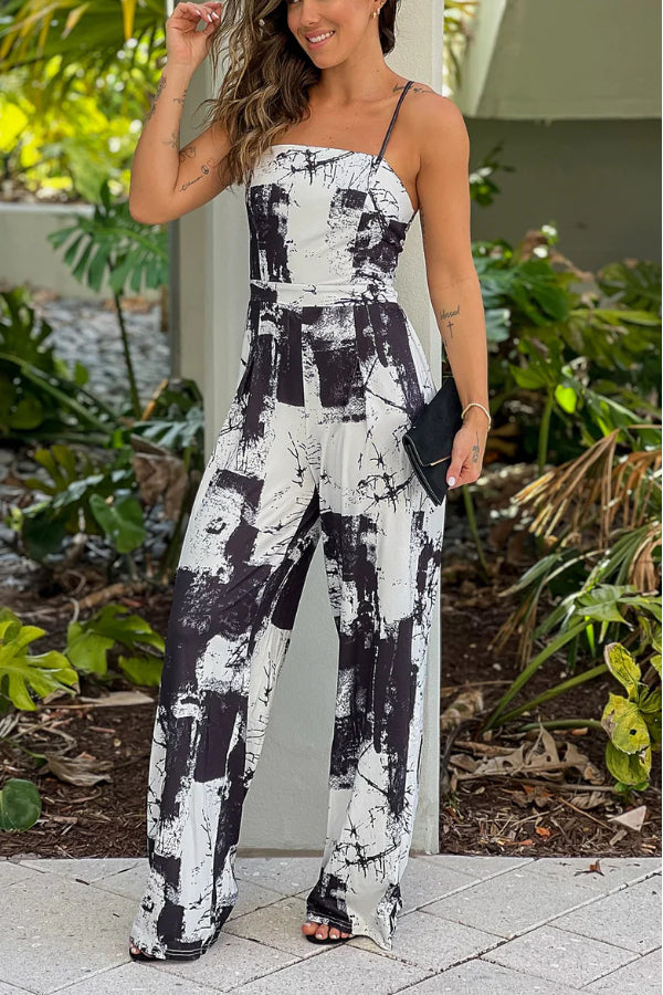 BLACK AND WHITE PRINTED JUMPSUIT WITH CRISS CROSS BACK
