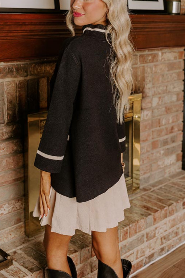 Suéter de punto Class Act con cuello alto, bolsillos y ribetes de color en contraste