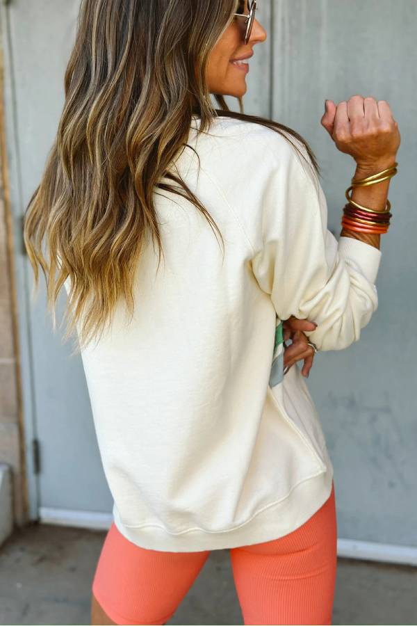 Sudadera con bloques de color arcoíris color albaricoque 