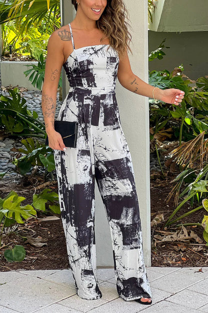 BLACK AND WHITE PRINTED JUMPSUIT WITH CRISS CROSS BACK