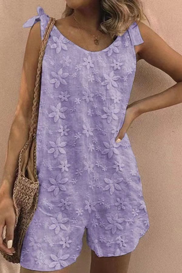 Mono sin mangas con cordones y bordado floral