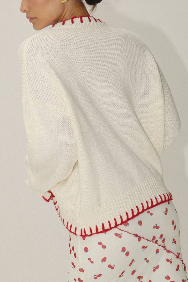 Suéter de punto con lazos rojos de Rosalia 