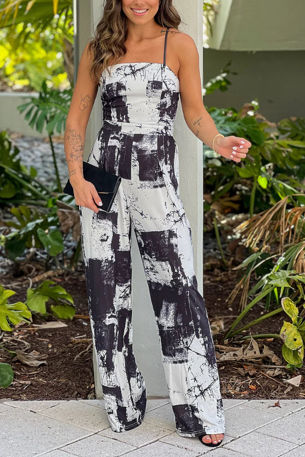 BLACK AND WHITE PRINTED JUMPSUIT WITH CRISS CROSS BACK