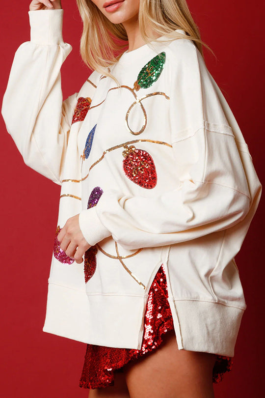 Sudadera con abertura y lentejuelas y luces navideñas