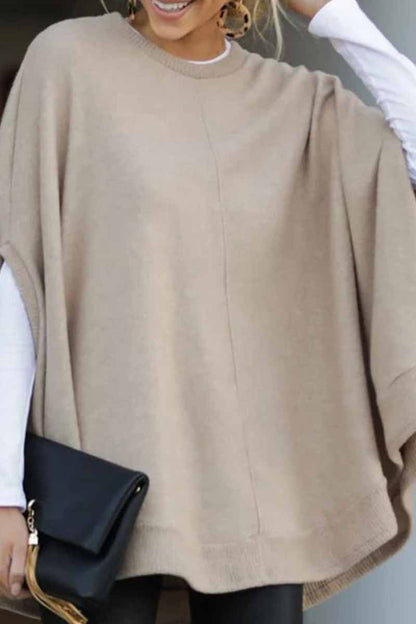 Tops holgados de cuello redondo con capa